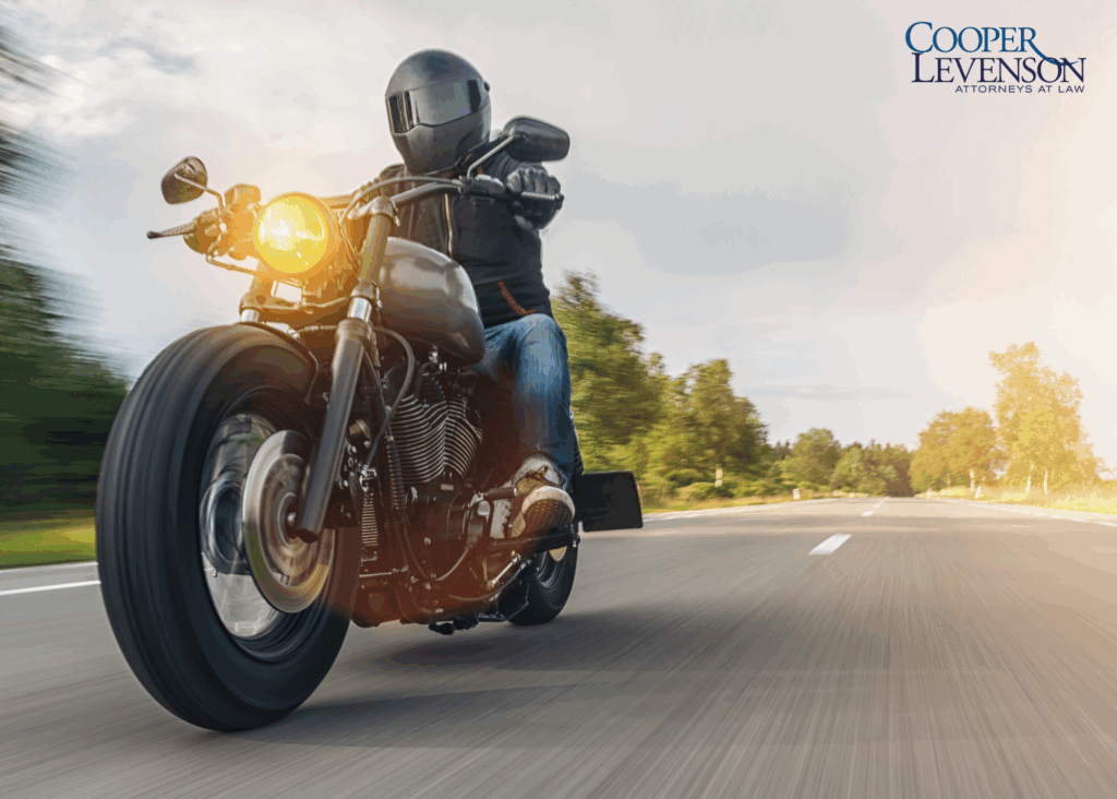 Motorcycle driving down the road