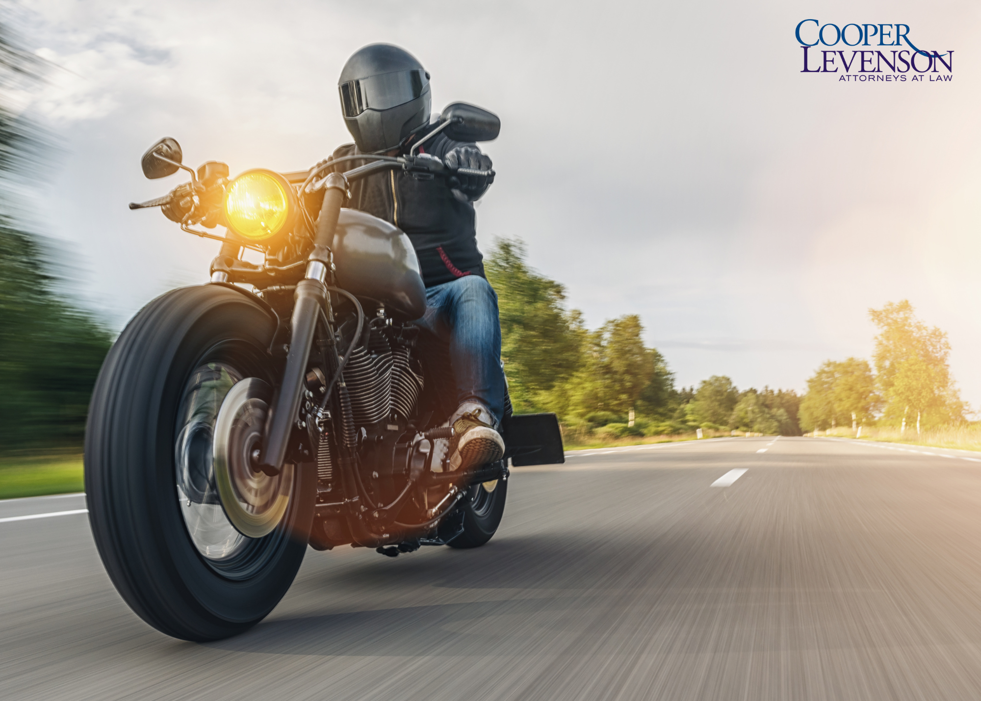 Motorcycle driving down the road