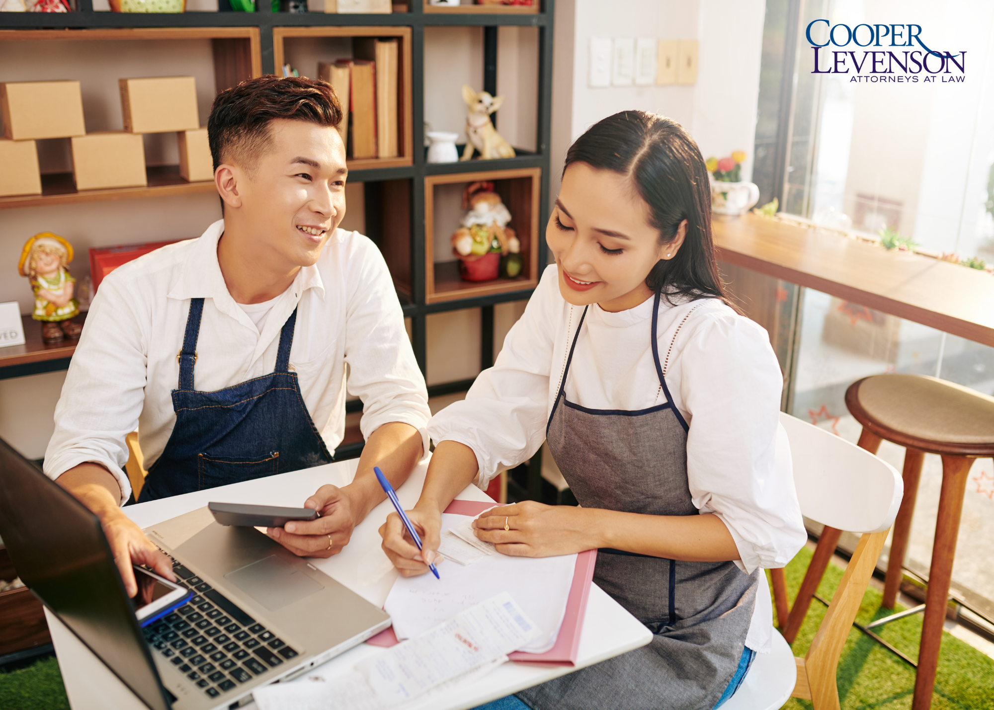 Small Business Owners Reviewing Finances