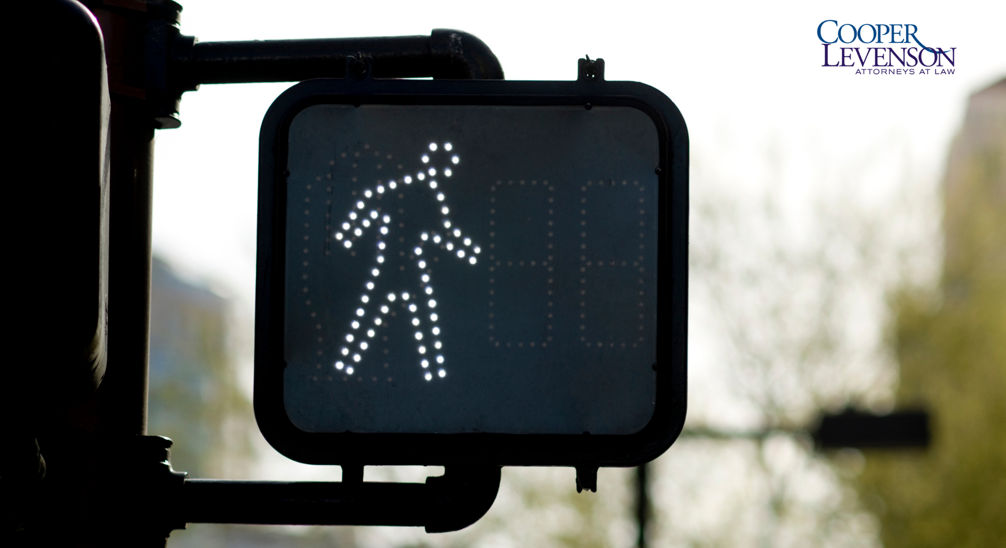 cross walk sign shows that it's safe for pedestrian to cross