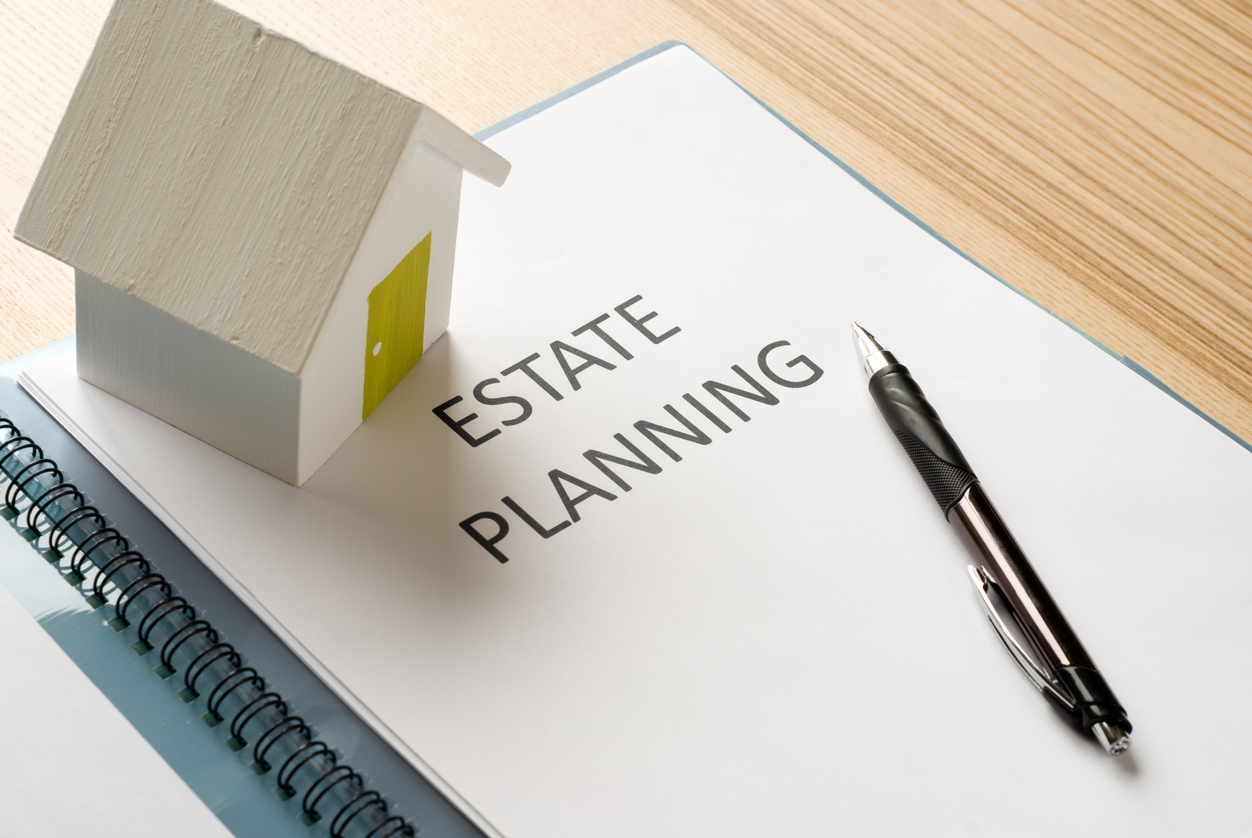 Estate Planning book with little house on it