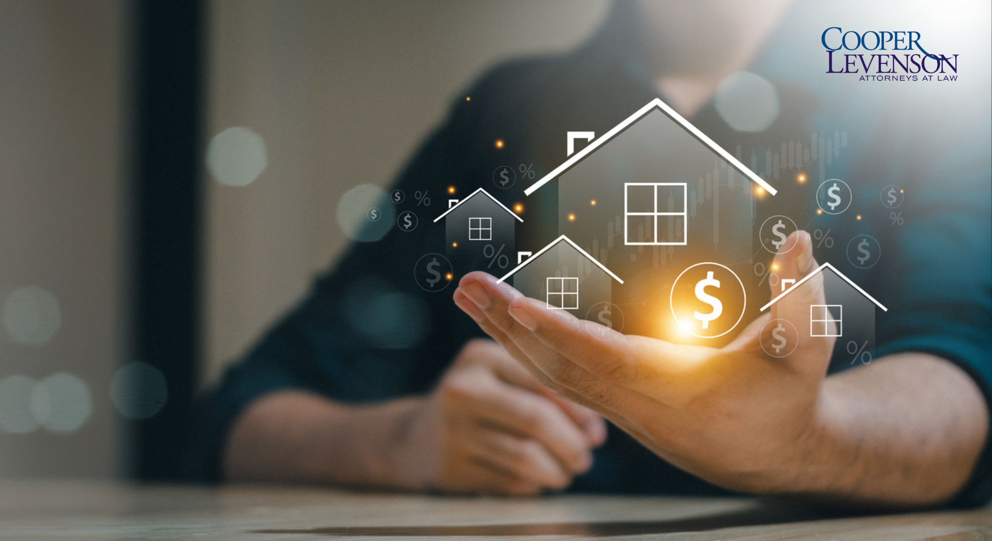Man holding image of homes with a dollar sign
