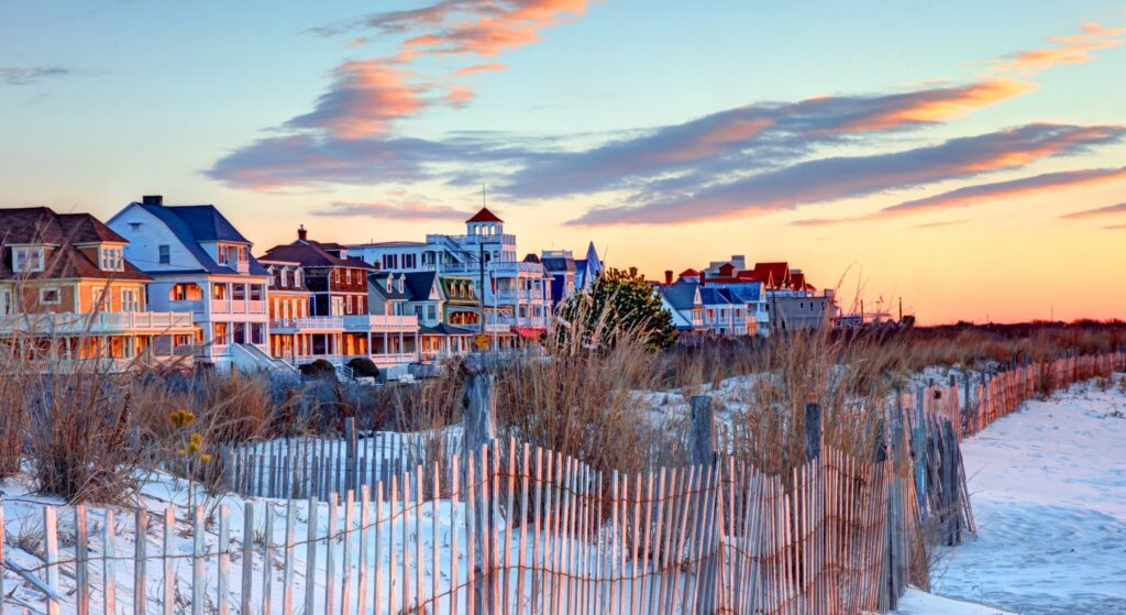 New Jersey Coast with houses, beach, and sand dunes.
