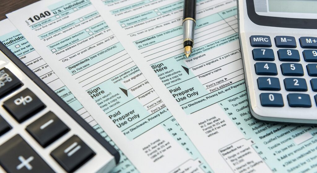photo of tax documents and calculators
